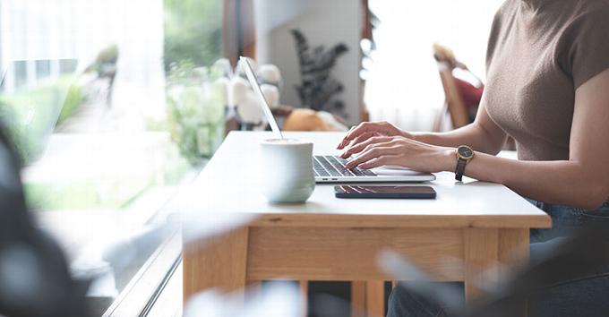 lady sitting at desk on laptop